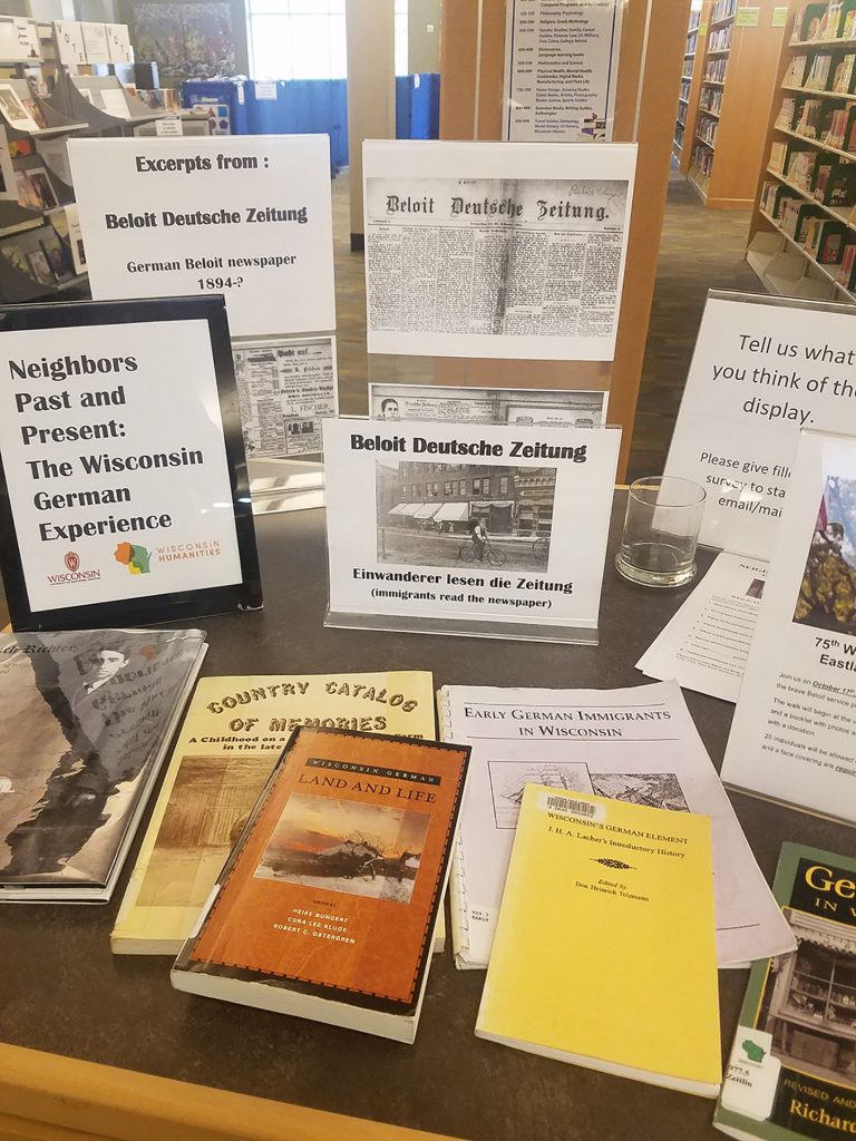 Display table at Beloit for MKI's traveling exhibit, Neighbors Past and Present