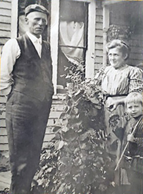 Albert Grimm, his wife, and son.